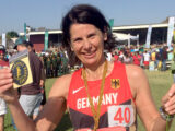 Barbara Mallmann beim Comrades 2017 mit Medaille